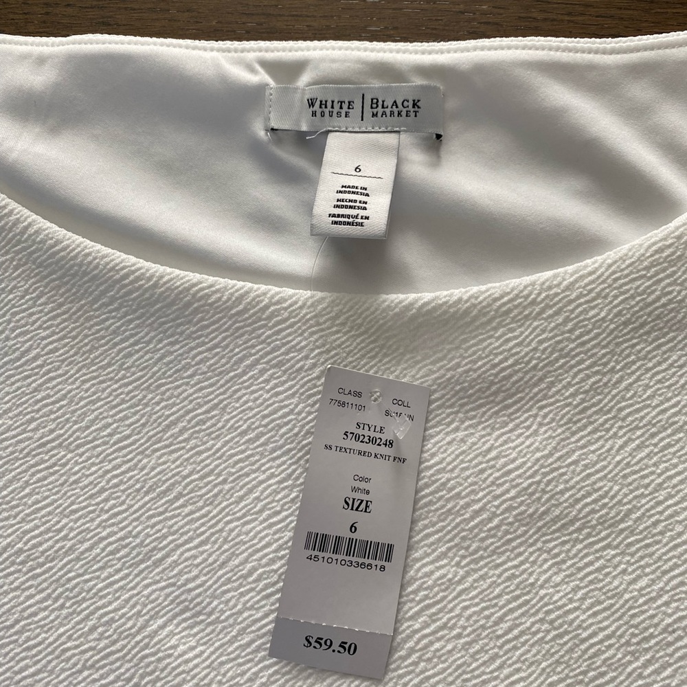 White dress from White House black market never worn, with tags size 6